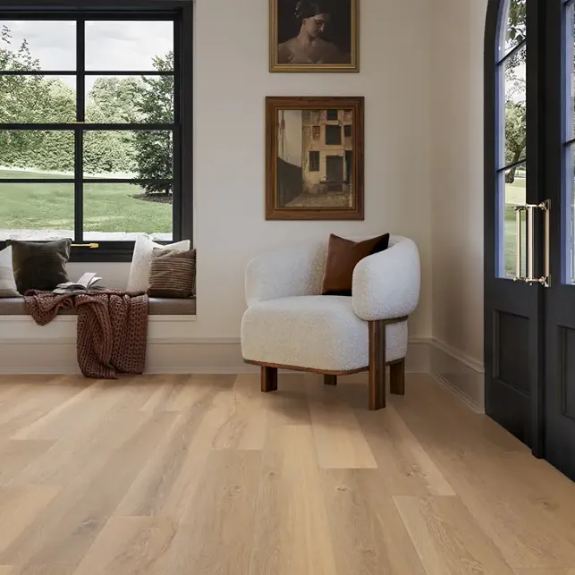 everest crest flooring installation in a living room with oil paintings 